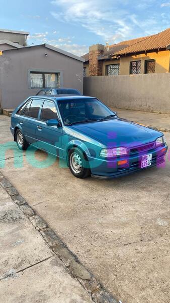 Buy used mazda 323 blue car in alberton in gauteng - imotoimoto